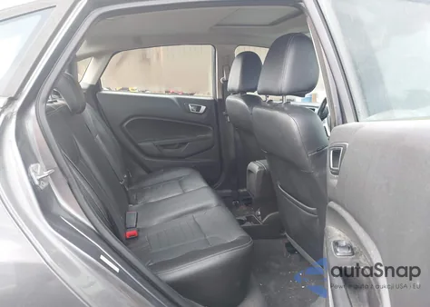 2014 Ford Fiesta Titanium z USA, uszkodzony, nr VIN 3FADP4CJ5EM220639